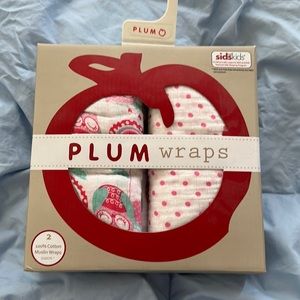 Brand new w tags. Plum wraps baby blankets.